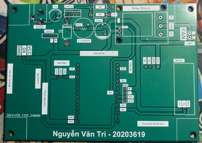 A green circuit board with white text

Description automatically generated